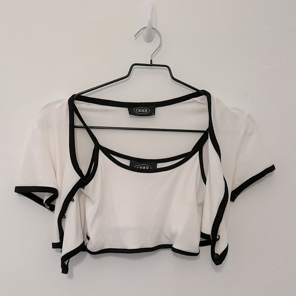 Very cropped black tie top, formal yet sexy. Great way to dress up any outfit!